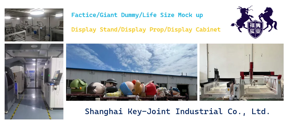 Production overview showing machining equipment, workshop space and large display props prepared for transport